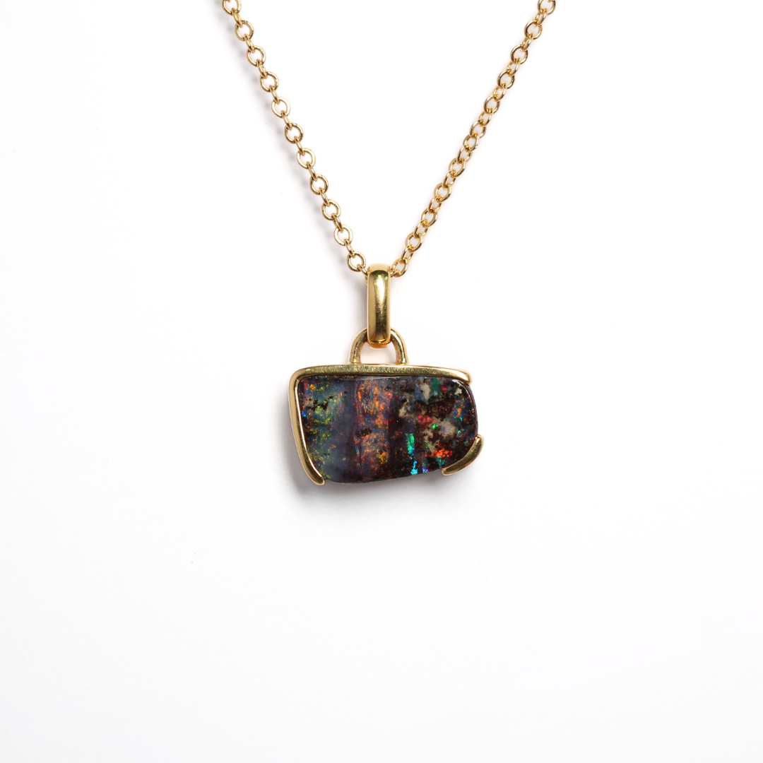 Boulder Opal Pendant with colours of brown, red and blue