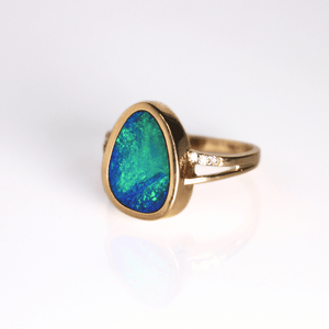 Bright blue and green Opal ring set in gold