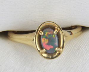 18Kt Yellow Gold Black Opal Ring with 4 Claw Setting