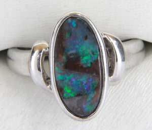 a Sterling silver ring set with an ovaloid Boulder Opal