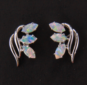 White Gold with 6 Crystal Opals set in a leaf like arrangement
